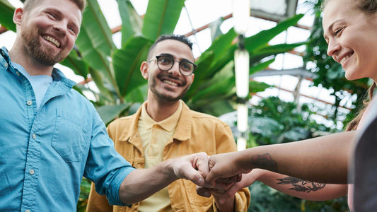 group of friends fist-bumping