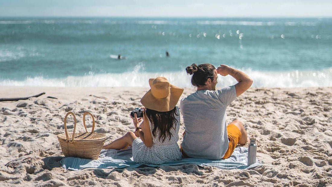 a couple relaxing at the beach