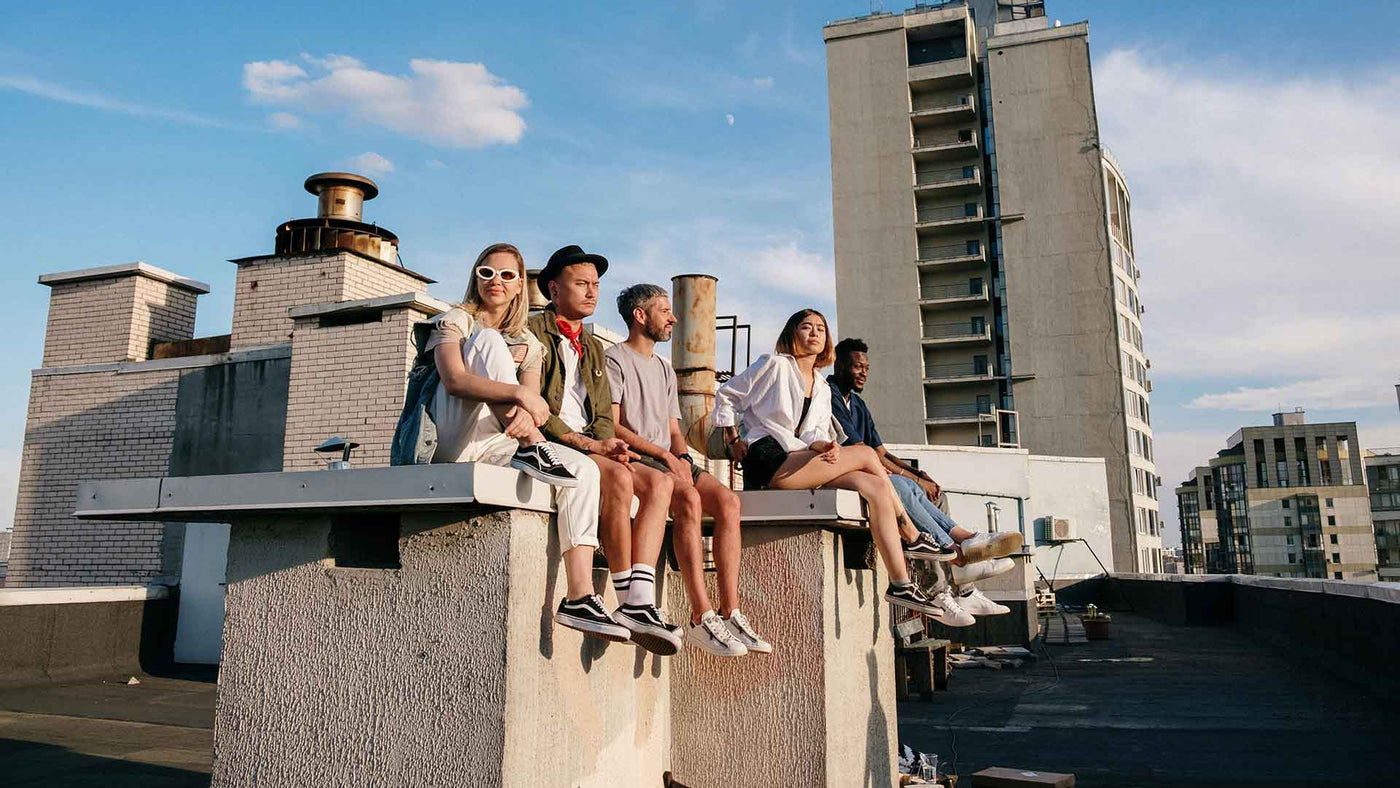 Group of friends sitting on rooftop