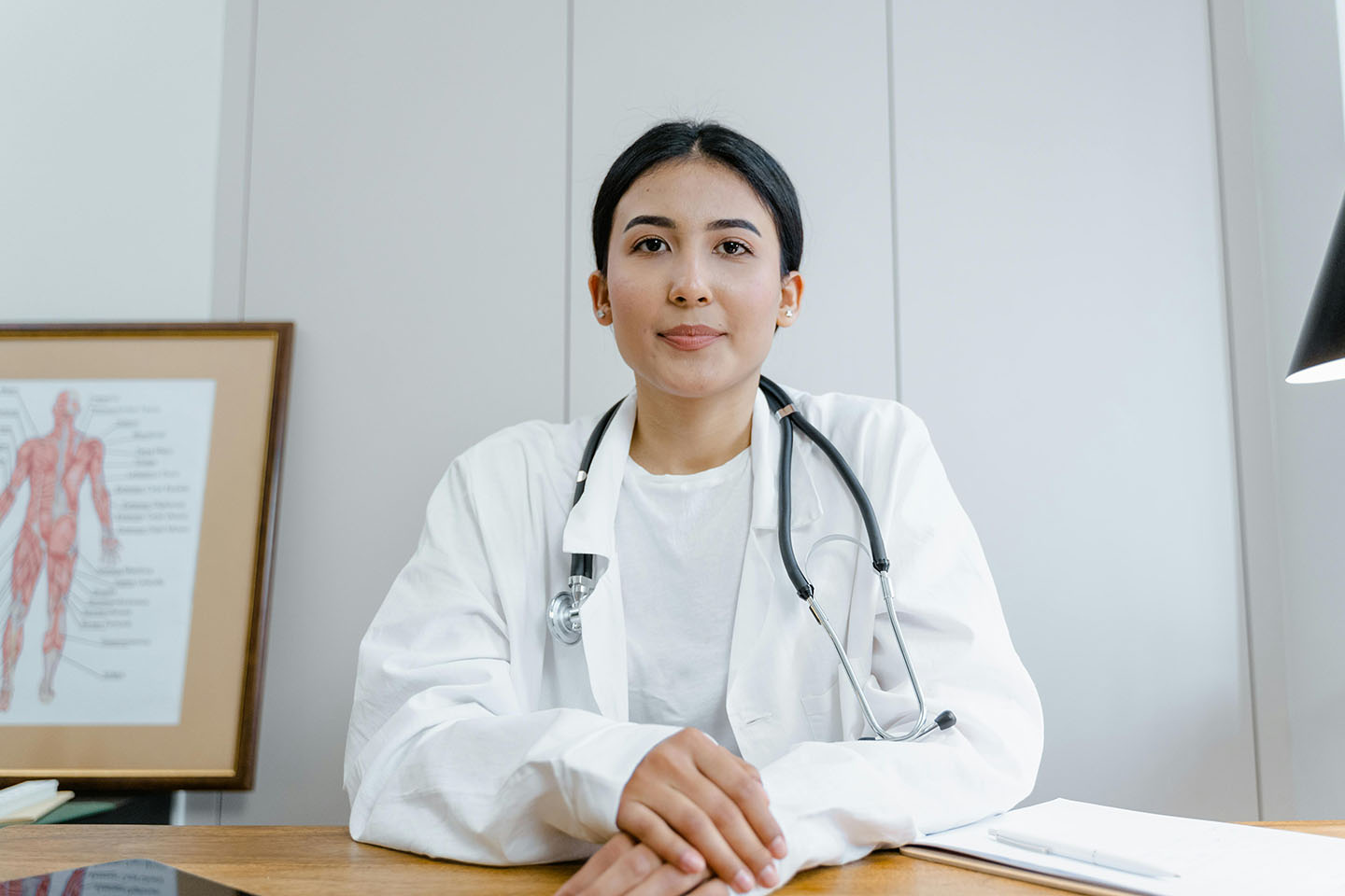 Female doctor sitting at a desk