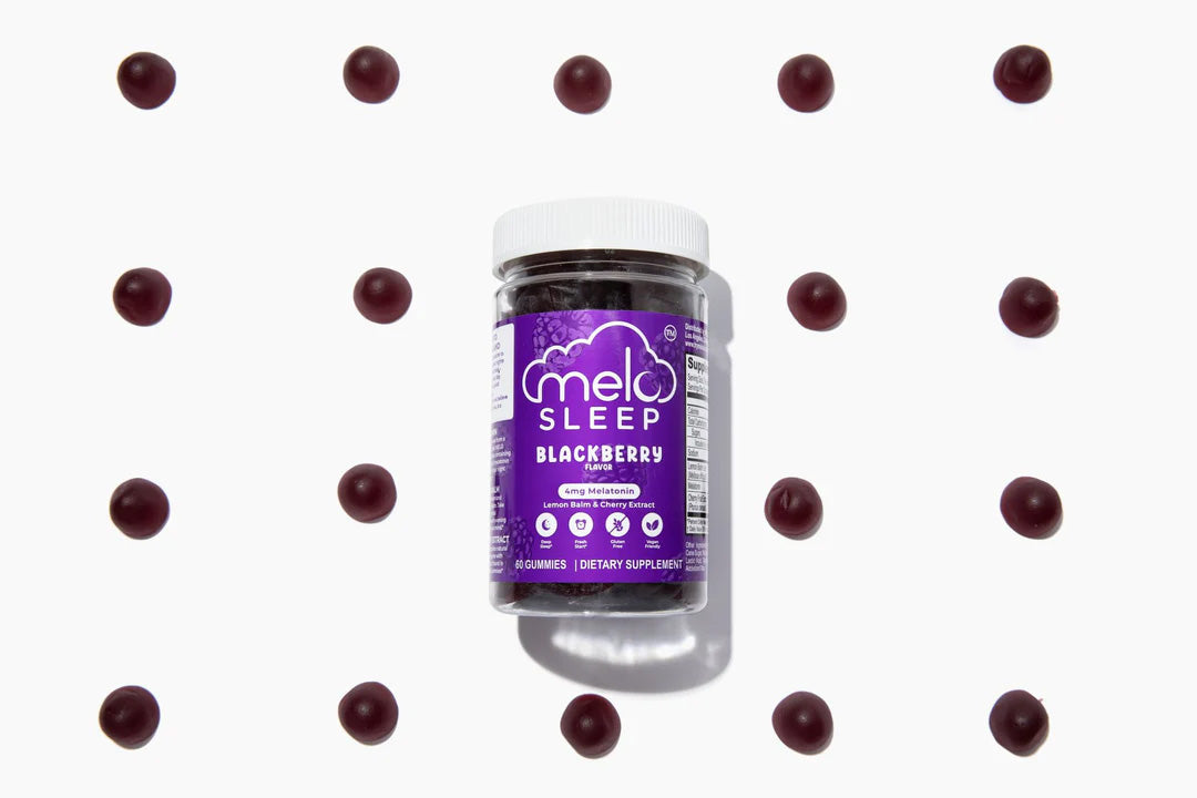 Bottle of Blackberry-flavored MELO Sleep gummies surrounded by individual gummies