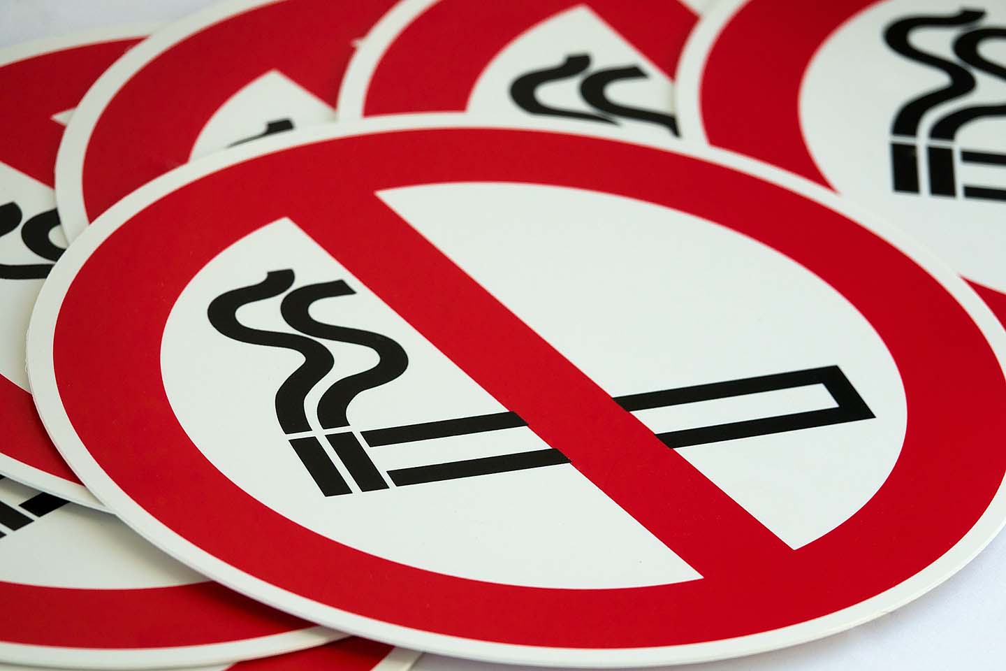 pile of no smoking signs