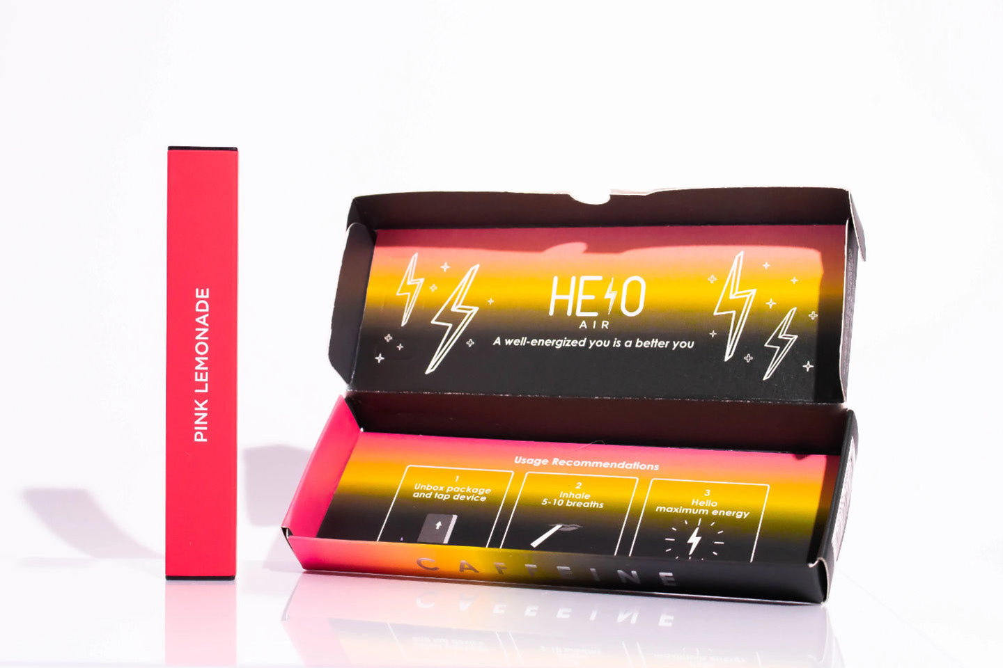 Pink disposable HELO vape next to colorful box