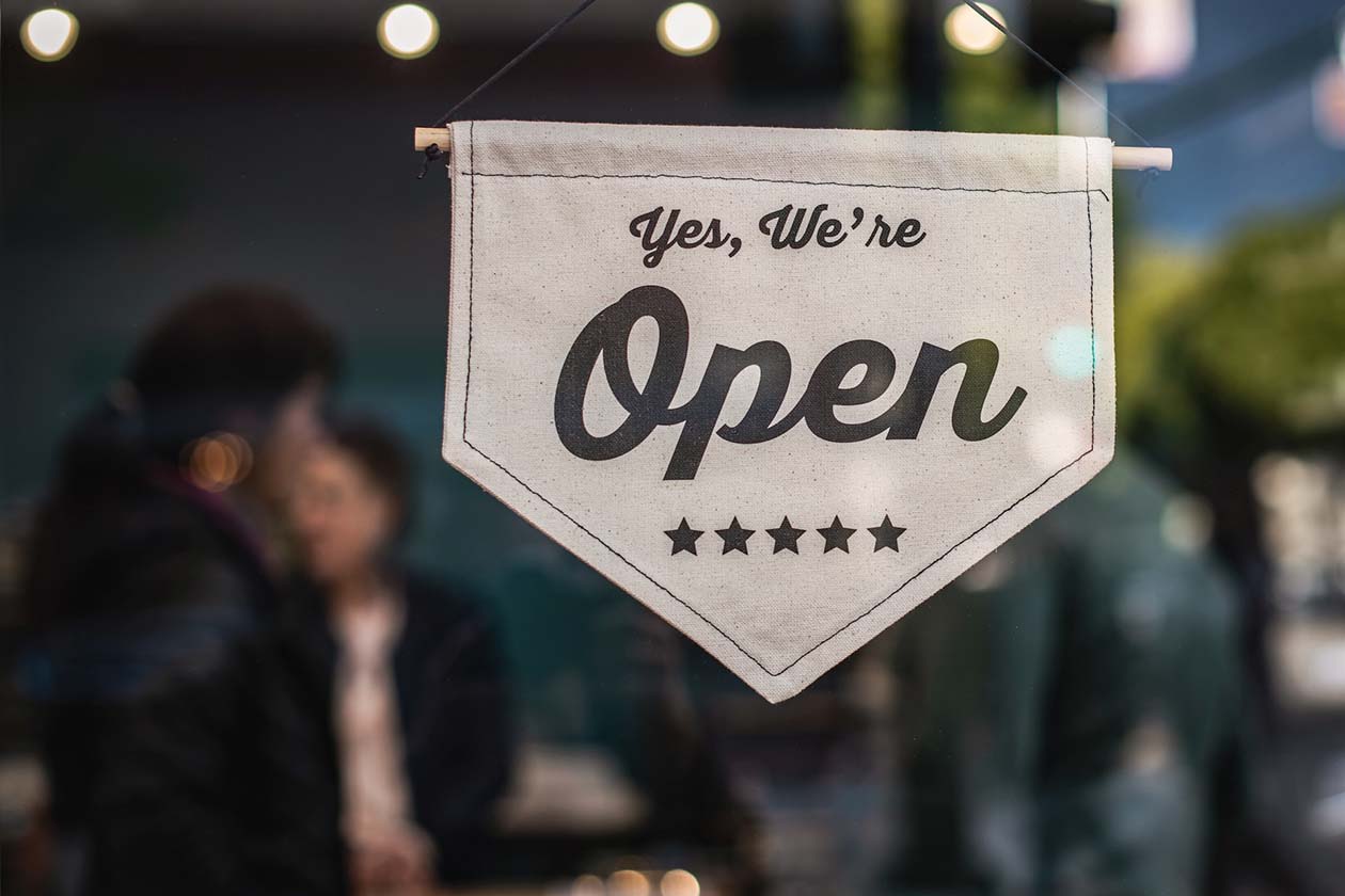 "Yes, We're Open" shop sign