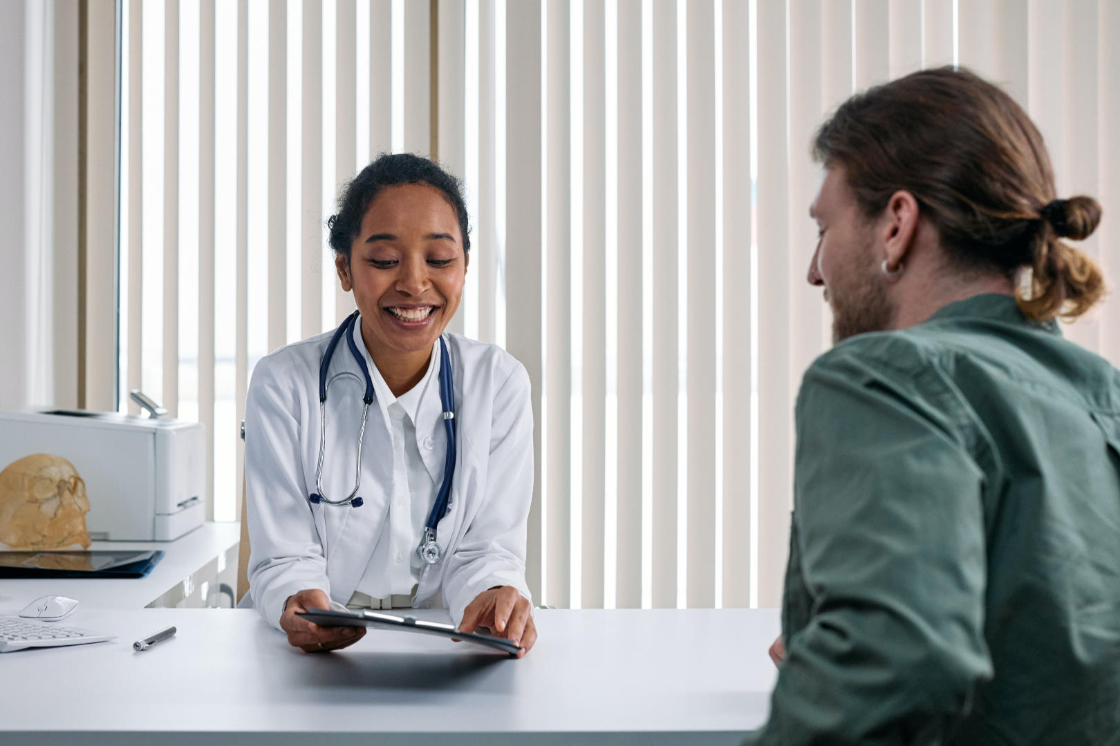 A patient consulting a doctor.