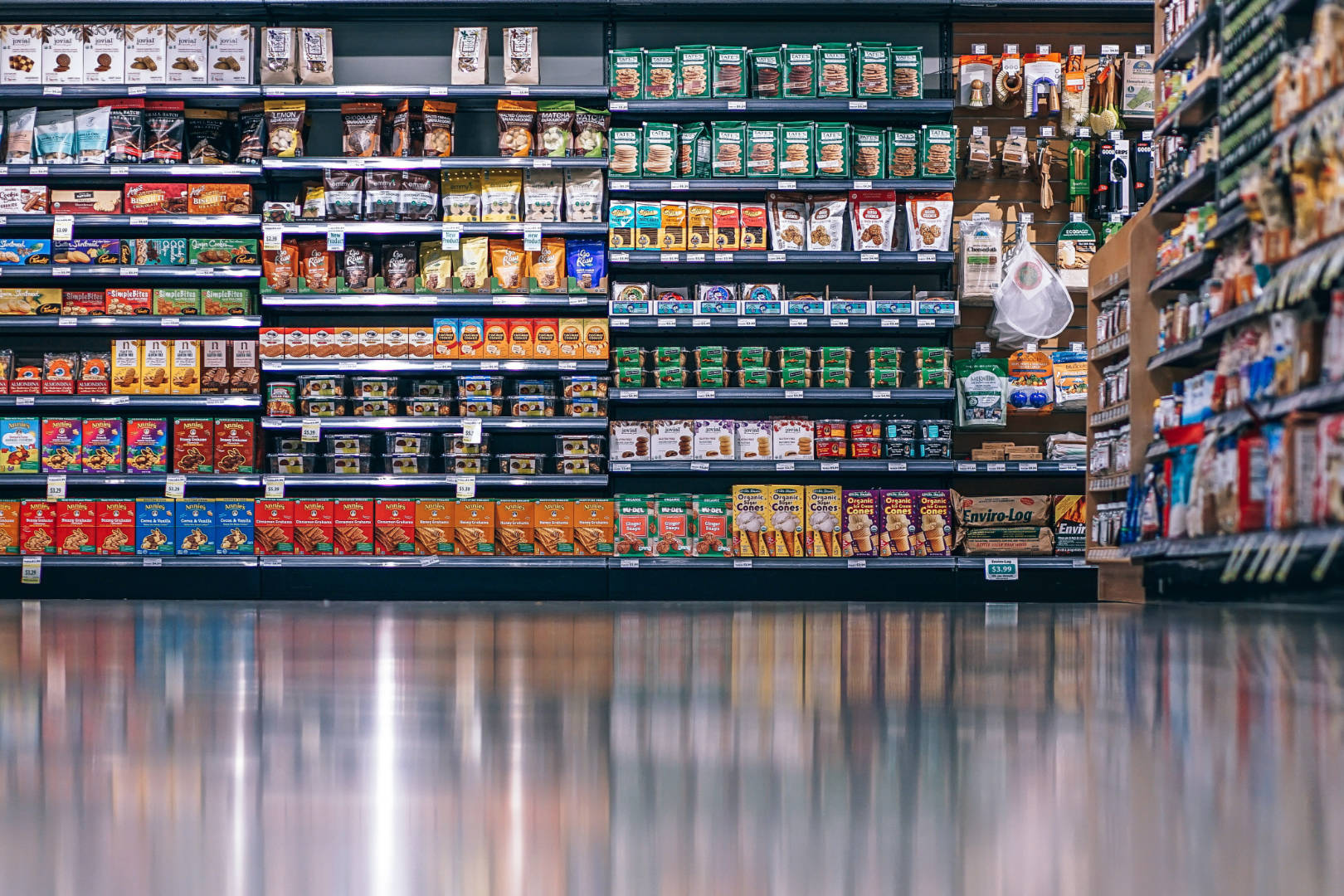 A grocery aisle showing different products displayed on shelves.