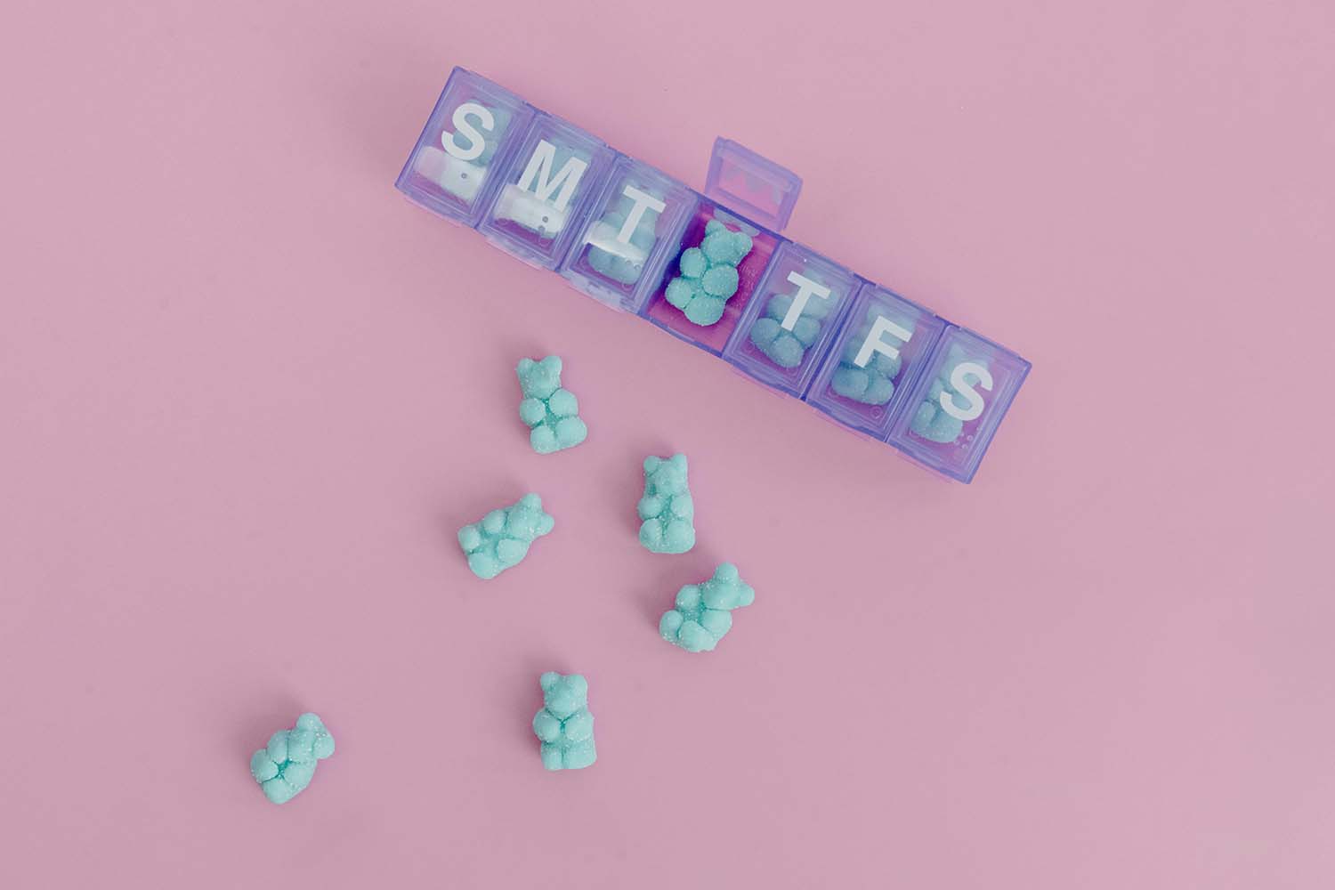 Melatonin gummies in a daily vitamin organizer