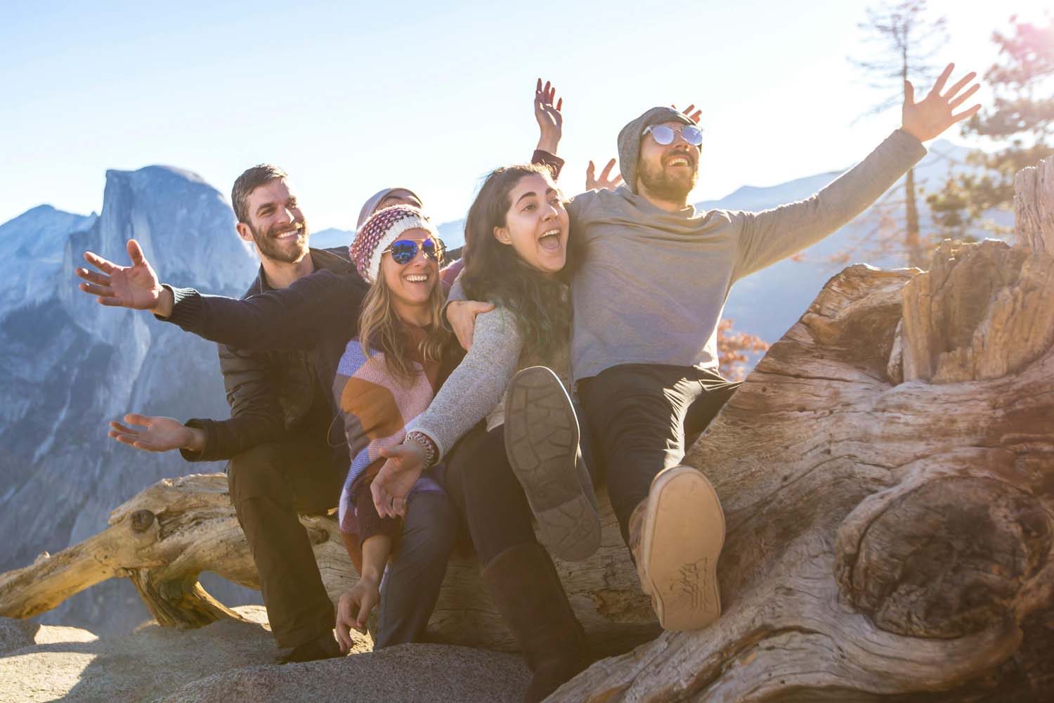 group photo of friends on a mountain