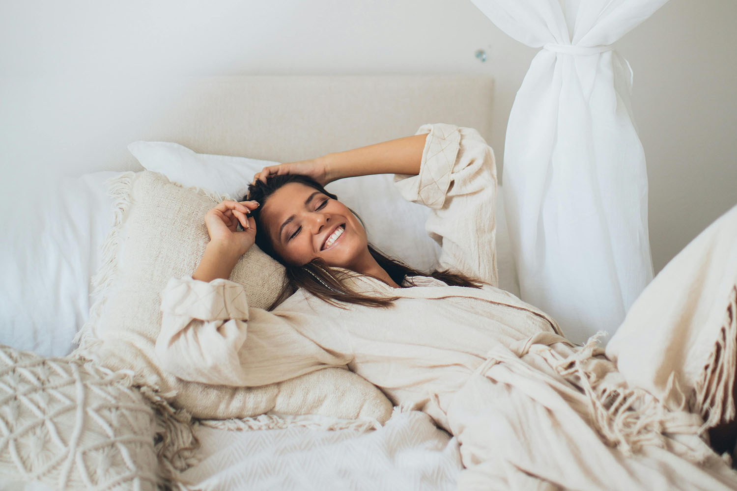 Woman lying on the bed