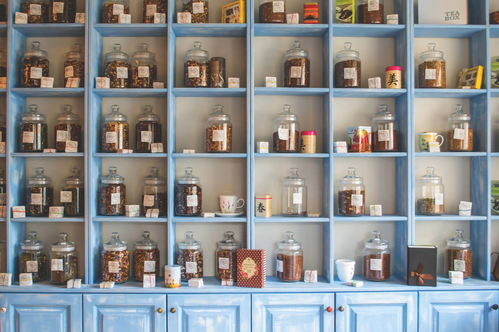 A shelf with several dried tea leaves.