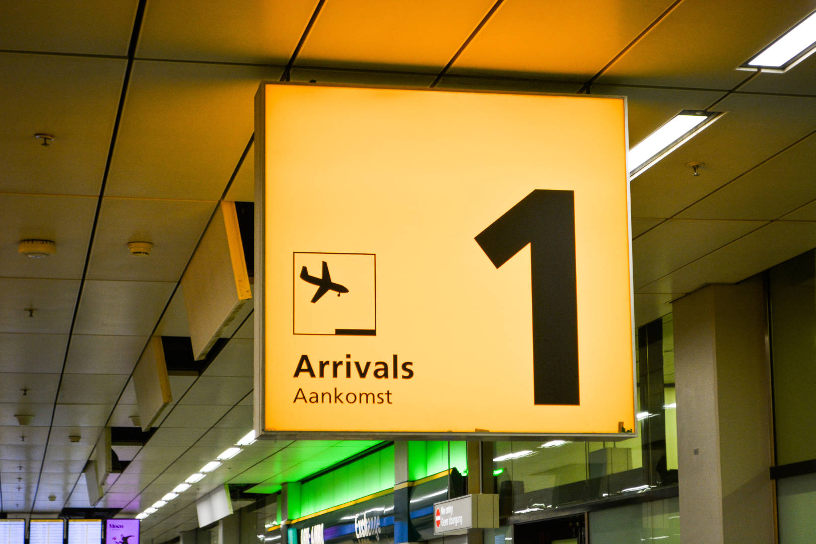 An arrivals signage in the airport.