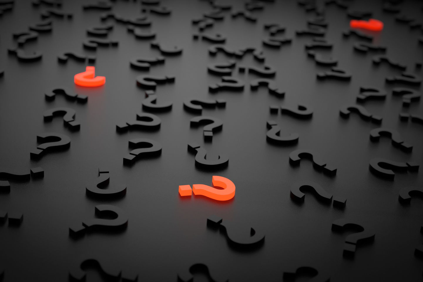 Several question marks scattered on the ground