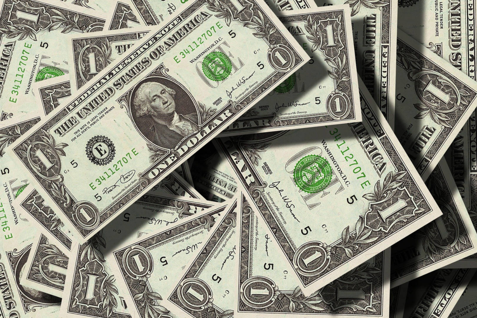 A pile of United States dollar notes