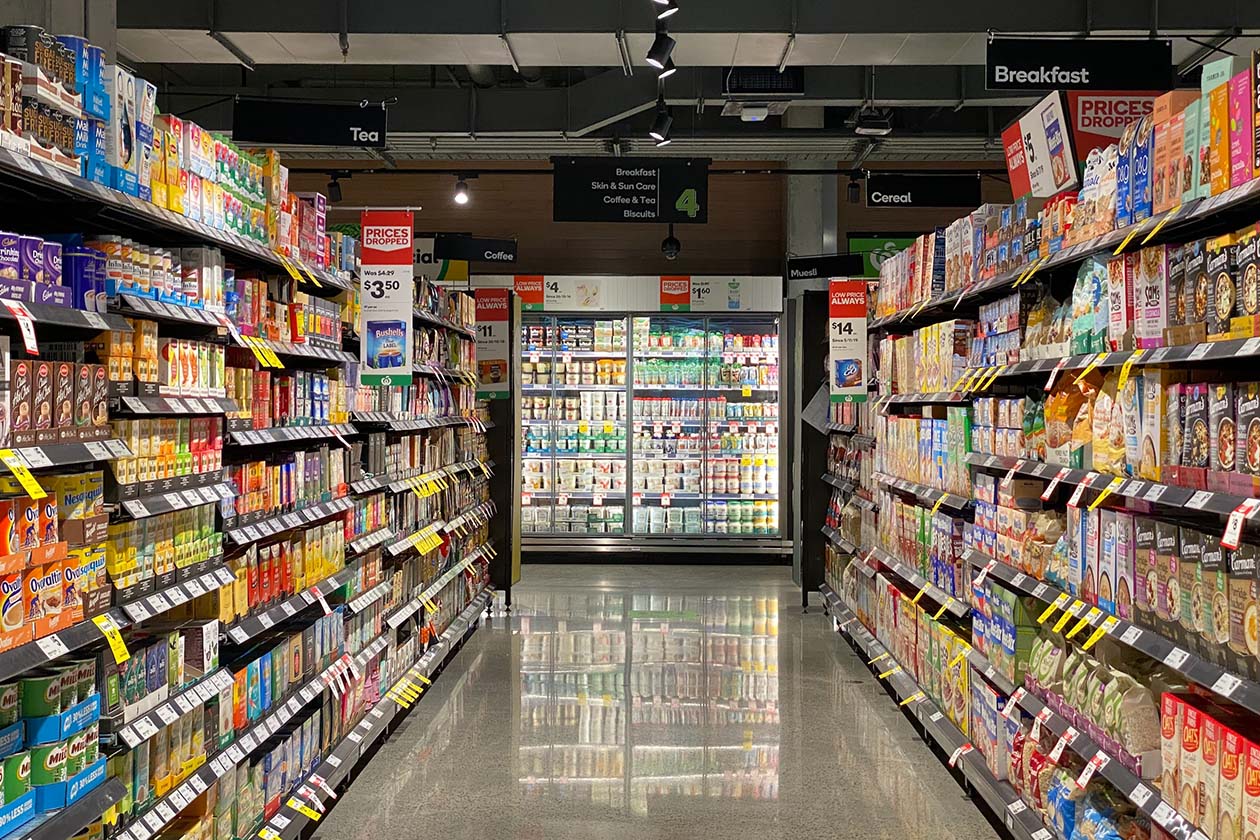 aisle filled with products in a convenience store